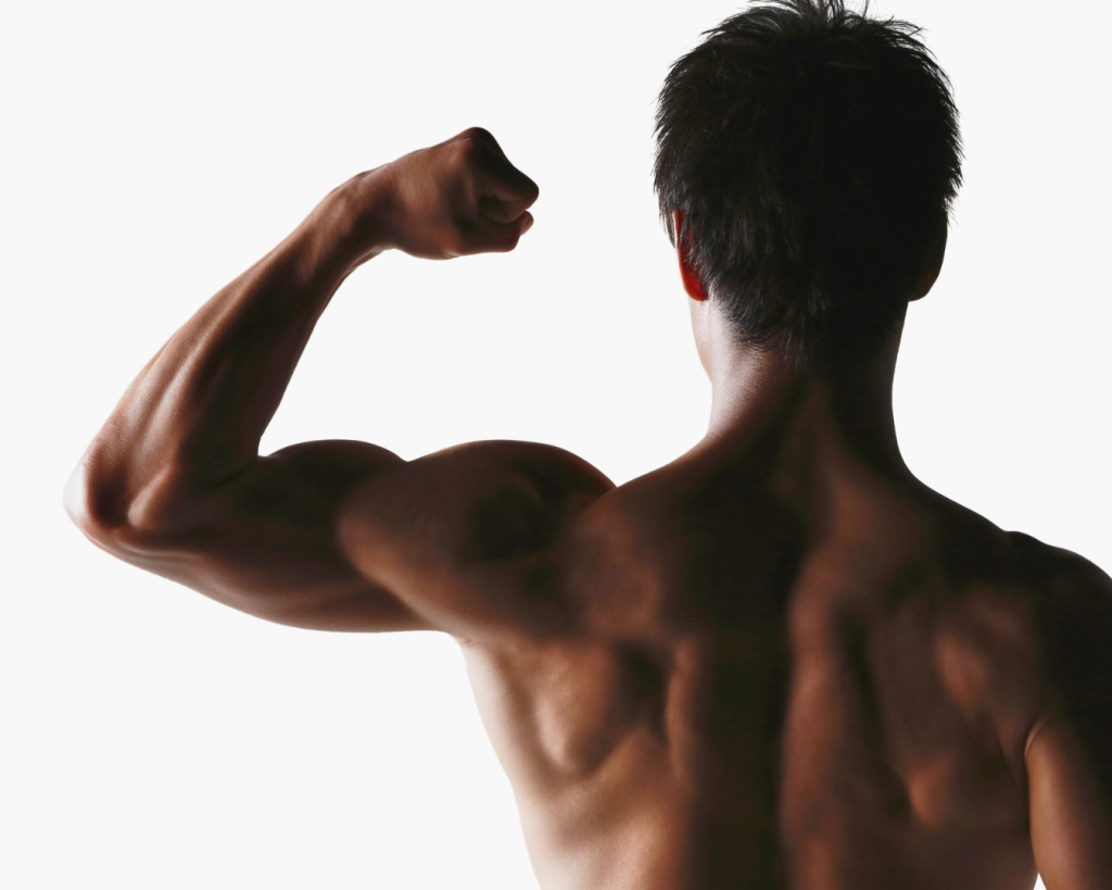 Muscular man flexing his arm for fitness and TRT results